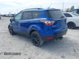 2017 Ford Escape SE with VIN 1FMCU0G94HUE90206, listed as a IAAI auction lot 42069904 with 86,883 mi miles. Bid and sale history available at carsss.com. Image 3.