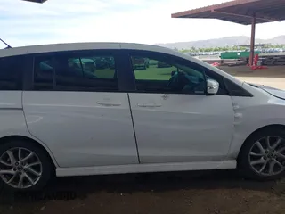 2013 Mazda 5 Touring with VIN JM1CW2CL0D0159894, listed as a IAAI auction lot 42386026 with 121,879 mi miles and . Bid and sale history available at DreamBid. Image 13.
