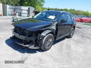 2018 Mazda CX-5 Sport with VIN JM3KFBBM4J0417018, listed as a IAAI auction lot 41984290 with 104,113 mi miles. Bid and sale history available at carsss.com. Image 18.
