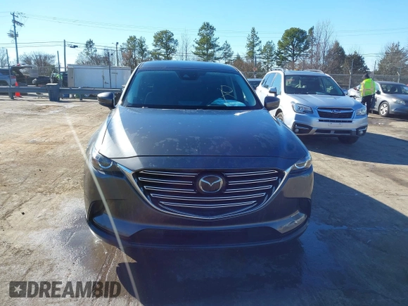 2022 Mazda CX-9 Sport with VIN JM3TCBBY5N0614589, listed as a IAAI auction lot 41295944 with 49,193 mi miles and . Bid and sale history available at DreamBid. Image 12.