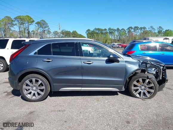 2019 Cadillac XT4 FWD Premium Luxury with VIN 1GYFZCR41KF204050, listed as a IAAI auction lot 41829040 with 69,136 mi miles. Bid and sale history available at carsss.com. Image 13.