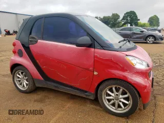 2009 Smart fortwo Pure with VIN WMEEJ31X79K271222, listed as a Copart auction lot 64583695 with 152,626 mi miles and Clean title. Bid and sale history available at DreamBid. Image 4.