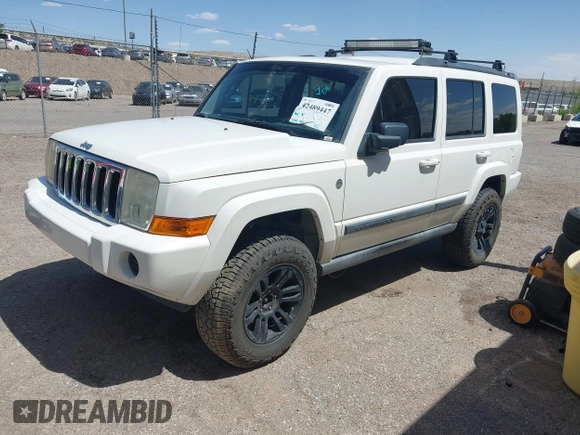 2007 Jeep Commander Sport with VIN 1J8HG48P97C601058, listed as a IAAI auction lot 42489447 with 200,103 mi miles and . Bid and sale history available at DreamBid. Image 2.