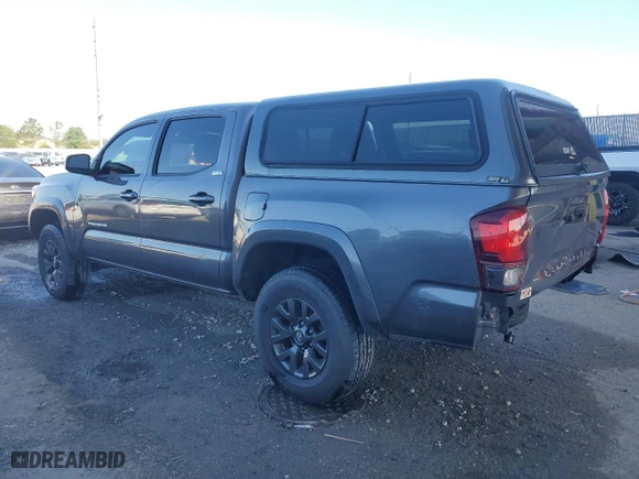 2021 Toyota Tacoma 2WD SR5 with VIN 5TFAZ5CN4MX105040, listed as a Copart auction lot 52088885 with 38,942 mi miles and Salvage Title. Bid and sale history available at carsss.com. Image 2.