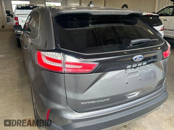 2021 Ford Edge Titanium z VIN 2FMPK3K97MBA51131, wystawiony jako IAAI lot #42529673 z przebiegiem 92 302 mil mil oraz . Historia ofert i sprzedaży dostępna na DreamBid. Obrazek 5.