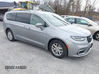 2021 Chrysler Pacifica Touring L with VIN 2C4RC1BG3MR542543, listed as a IAAI auction lot 41657073 with 118,833 mi miles and . Bid and sale history available at DreamBid. Image 1.