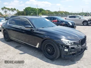 2018 BMW 7 Series 740i xDrive z VIN WBA7E4C52JGV23573, wystawiony jako IAAI lot #42056282 z przebiegiem 57 813 mil mil oraz . Historia ofert i sprzedaży dostępna na DreamBid. Obrazek 1.
