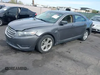 2013 Ford Taurus SEL with VIN 1FAHP2E82DG230831, listed as a IAAI auction lot 42078978 with 207,075 mi miles and . Bid and sale history available at carsss.com. Image 2.