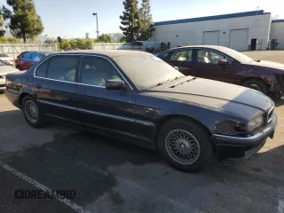 2001 BMW 7 Series 740iL with VIN WBAGH83461DP29311, listed as a Copart auction lot 75264604 with 143,972 mi miles and Clean Title. Bid and sale history available at carsss.com. Image 4.