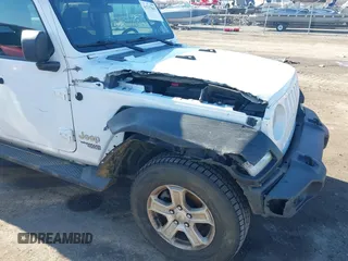 2020 Jeep Wrangler Unlimited Sport S with VIN 1C4HJXDN6LW161341, listed as a IAAI auction lot 41217843 with 74,196 mi miles and . Bid and sale history available at DreamBid. Image 6.