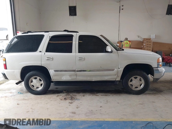 2004 GMC Yukon SLE z VIN 1GKEC13V64R107506, wystawiony jako IAAI lot #41407353 z przebiegiem 215 127 mil mil oraz . Historia ofert i sprzedaży dostępna na DreamBid. Obrazek 13.