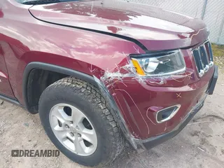 2016 Jeep Grand Cherokee Laredo with VIN 1C4RJFAG8GC318878, listed as a IAAI auction lot 42600747 with 85,882 mi miles and . Bid and sale history available at DreamBid. Image 17.