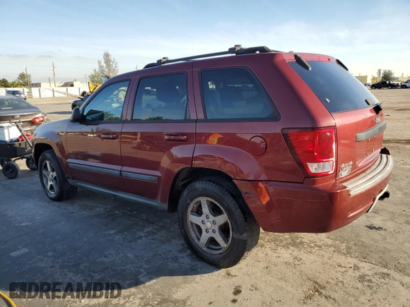 2007 Jeep Grand Cherokee Laredo z VIN 1J8GR48K07C649302, wystawiony jako Copart lot #82167894 z przebiegiem 255 780 mil mil oraz Czysty tytuł • Clean title. Historia ofert i sprzedaży dostępna na DreamBid. Obrazek 2.
