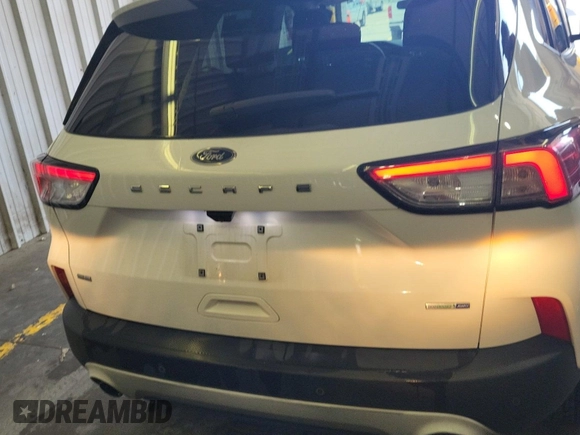 2020 Ford Escape SE with VIN 1FMCU9G60LUB25735, listed as a IAAI auction lot 42663606 with 91,591 mi miles and . Bid and sale history available at DreamBid. Image 4.