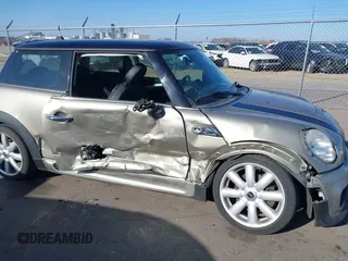 2007 MINI Hardtop S with VIN WMWMF73567TL91385, listed as a IAAI auction lot 41866865 with 114,778 mi miles and . Bid and sale history available at DreamBid. Image 6.