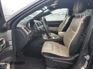 2016 Jeep Grand Cherokee Limited 75th Anniversary with VIN 1C4RJFBGXGC482082, listed as a Copart auction lot 56217165 with 80,787 mi miles and Salvage Title. Bid and sale history available at DreamBid. Image 7.