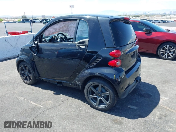 2015 Smart fortwo Passion z VIN WMEEJ3BA0FK812651, wystawiony jako IAAI lot #42063112 z przebiegiem 25 270 mil mil oraz . Historia ofert i sprzedaży dostępna na DreamBid. Obrazek 3.