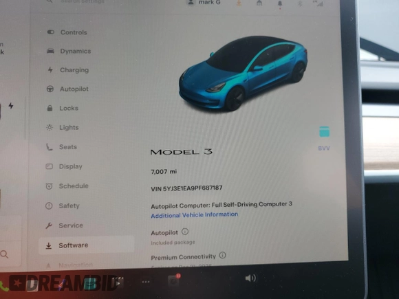2023 Tesla Model 3 with VIN 5YJ3E1EA9PF687187, listed as a Copart auction lot 61044055 with 7,007 mi miles and Salvage title. Bid and sale history available at DreamBid. Image 9.