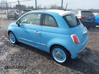 2015 FIAT 500 Lounge with VIN 3C3CFFCR2FT528180, listed as a IAAI auction lot 41674870 with 29,454 mi miles and . Bid and sale history available at DreamBid. Image 3.