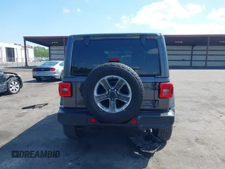 2022 Jeep Wrangler Unlimited Sahara with VIN 1C4HJXEN2NW194502, listed as a IAAI auction lot 42002455 with 34,861 mi miles and . Bid and sale history available at DreamBid. Image 16.