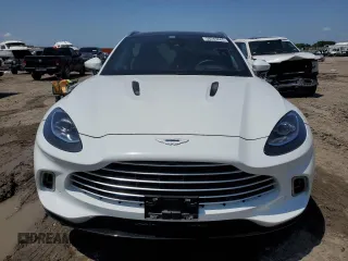 2021 Aston Martin DBX z VIN SCFVUJAW8MTV02781, wystawiony jako Copart lot #56249665 z przebiegiem 19 901 mil mil oraz Szkoda całkowita • Salvage title. Historia ofert i sprzedaży dostępna na DreamBid. Obrazek 5.