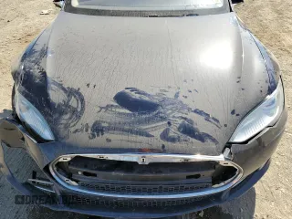 2013 Tesla Model S with VIN 5YJSA1AC9DFP10400, listed as a Copart auction lot 59047985 with 165,166 mi miles and Salvage title. Bid and sale history available at DreamBid. Image 11.