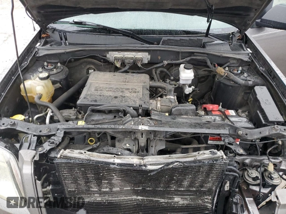 2009 Mercury Mariner with VIN 4M2CU81G39KJ17532, listed as a Copart auction lot 43907455 with 214,212 mi miles and Salvage title. Bid and sale history available at DreamBid. Image 14.