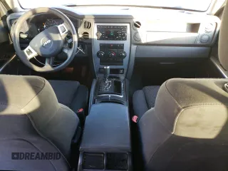 2008 Jeep Commander Sport z VIN 1J8HH48KX8C105432, wystawiony jako Copart lot #86000854 z przebiegiem 201 869 mil mil oraz Szkoda całkowita • Salvage title. Historia ofert i sprzedaży dostępna na DreamBid. Obrazek 8.