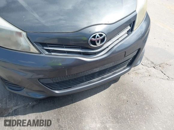 2012 Toyota Yaris L with VIN JTDKTUD38CD540219, listed as a IAAI auction lot 42091750 with 152,878 mi miles. Bid and sale history available at carsss.com. Image 6.