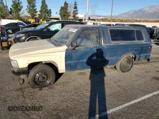 1988 Toyota Pickup with VIN JT4RN50RXJ5154255, listed as a Copart auction lot 87532245 with 238,173 mi miles and Salvage Title. Bid and sale history available at DreamBid. Image 1.