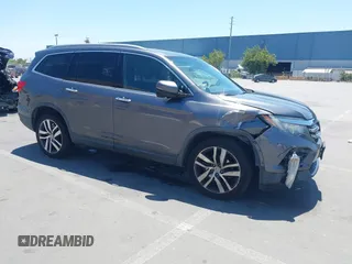 2017 Honda Pilot Touring with VIN 5FNYF6H98HB012885, listed as a IAAI auction lot 42468001 with 143,856 mi miles and . Bid and sale history available at DreamBid. Image 1.