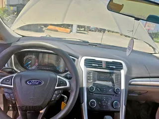 2015 Ford Fusion SE z VIN 3FA6P0H76FR282568, wystawiony jako Copart lot #62422615 z przebiegiem 142 311 mil mil oraz Czysty tytuł • Clean title. Historia ofert i sprzedaży dostępna na DreamBid. Obrazek 9.