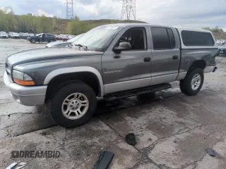 2002 Dodge Dakota SLT z VIN 1B7HG48N52S584957, wystawiony jako Copart lot #55178675 z przebiegiem 175 894 mil mil oraz Szkoda całkowita • Salvage title. Historia ofert i sprzedaży dostępna na DreamBid. Obrazek 1.