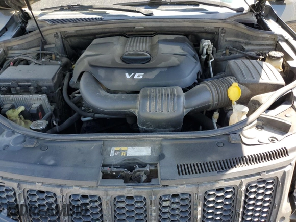 2015 Jeep Grand Cherokee Overland with VIN 1C4RJFCG3FC104439, listed as a Copart auction lot 50780295 with 196,549 mi miles and Salvage Title. Bid and sale history available at carsss.com. Image 13.