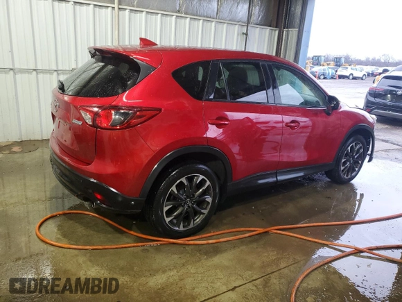 2016 Mazda CX-5 Grand Touring with VIN JM3KE4DY6G0714766, listed as a Copart auction lot 47468885 with 146,696 mi miles and Salvage Title. Bid and sale history available at carsss.com. Image 3.