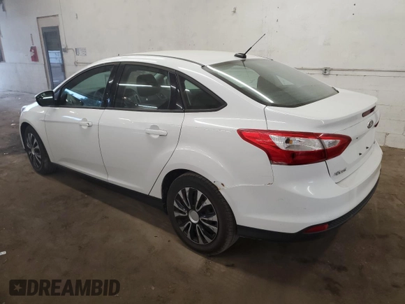 2012 Ford Focus SE with VIN 1FAHP3F23CL236482, listed as a Copart auction lot 62279735 with 127,239 mi miles and Salvage title. Bid and sale history available at DreamBid. Image 2.