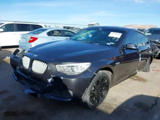 2016 BMW 5 Series Gran Turismo 550i xDrive with VIN WBA5M0C55GD085158, listed as a IAAI auction lot 41170628 with 96,537 mi miles. Bid and sale history available at carsss.com. Image 16.