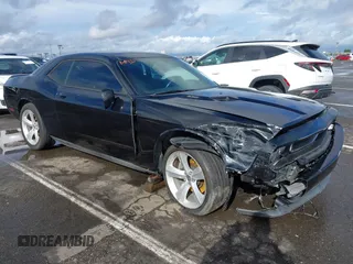 2013 Dodge Challenger R/T with VIN 2C3CDYBT8DH557140, listed as a IAAI auction lot 41579965 with 120,804 mi miles. Bid and sale history available at carsss.com. Image 1.