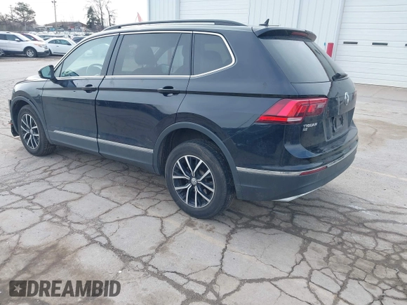 2021 Volkswagen Tiguan SE with VIN 3VV2B7AXXMM057849, listed as a IAAI auction lot 41879768 with 88,353 mi miles and . Bid and sale history available at DreamBid. Image 3.