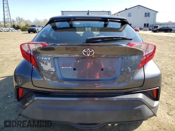 2019 Toyota C-HR XLE z VIN NMTKHMBX4KR084471, wystawiony jako Copart lot #52575985 z przebiegiem 54 578 mil mil oraz Szkoda całkowita • Salvage title. Historia ofert i sprzedaży dostępna na DreamBid. Obrazek 6.