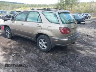 1999 Lexus RX 300 Luxury SUV with VIN JT6GF10U7X0026361, listed as a IAAI auction lot 41790525 with 219,054 mi miles. Bid and sale history available at carsss.com. Image 3.