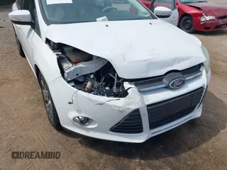 2014 Ford Focus SE with VIN 1FADP3K25EL251024, listed as a IAAI auction lot 42123157 with 74,311 mi miles and . Bid and sale history available at carsss.com. Image 6.