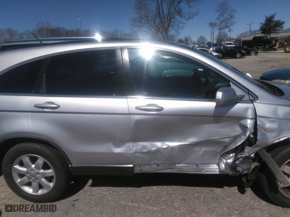 2009 Honda CR-V EX-L with VIN JHLRE48799C014186, listed as a IAAI auction lot 41717915 with 170,157 mi miles. Bid and sale history available at carsss.com. Image 13.
