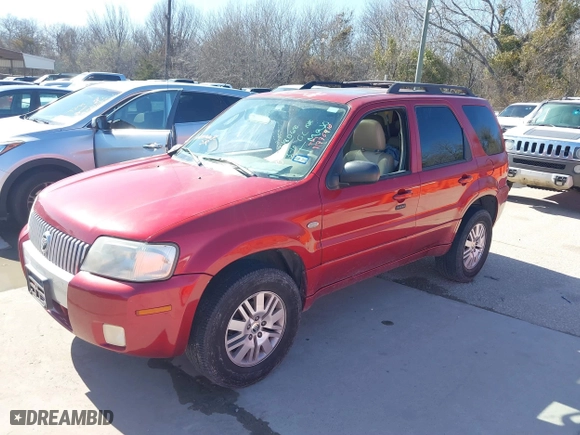 2006 Mercury Mariner Luxury with VIN 4M2YU56136KJ18068, listed as a IAAI auction lot 41776410 with 170,619 mi miles. Bid and sale history available at carsss.com. Image 2.