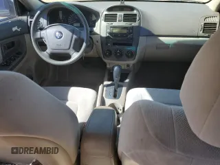 2006 Kia Spectra EX with VIN KNAFE122X65277053, listed as a Copart auction lot 75697314 with 147,156 mi miles and Salvage Title. Bid and sale history available at carsss.com. Image 8.