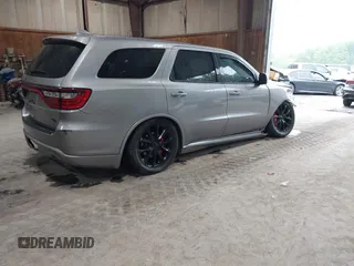 2017 Dodge Durango R/T with VIN 1C4SDJCT0HC799202, listed as a IAAI auction lot 42295142 with 83,103 mi miles and . Bid and sale history available at DreamBid. Image 4.