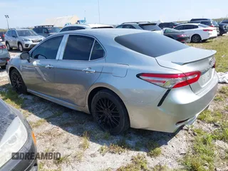 2018 Toyota Camry LE z VIN 4T1B11HK8JU155953, wystawiony jako IAAI lot #40609365 z przebiegiem 53 296 mil mil oraz . Historia ofert i sprzedaży dostępna na DreamBid. Obrazek 3.