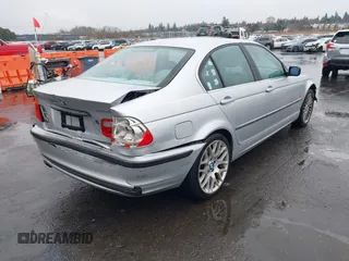 2001 BMW 3 Series 330i with VIN WBAAV53441FJ64705, listed as a IAAI auction lot 41632831 with 211,862 mi miles. Bid and sale history available at carsss.com. Image 4.