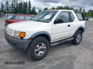 1998 Isuzu Rodeo with VIN 4S2CM57W9W4373049, listed as a IAAI auction lot 42599157 with 140,368 mi miles and . Bid and sale history available at DreamBid. Image 2.