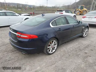 2015 Jaguar XF V6 Portfolio with VIN SAJWJ0FF5F8U67140, listed as a IAAI auction lot 41967522 with 68,000 mi miles. Bid and sale history available at carsss.com. Image 4.